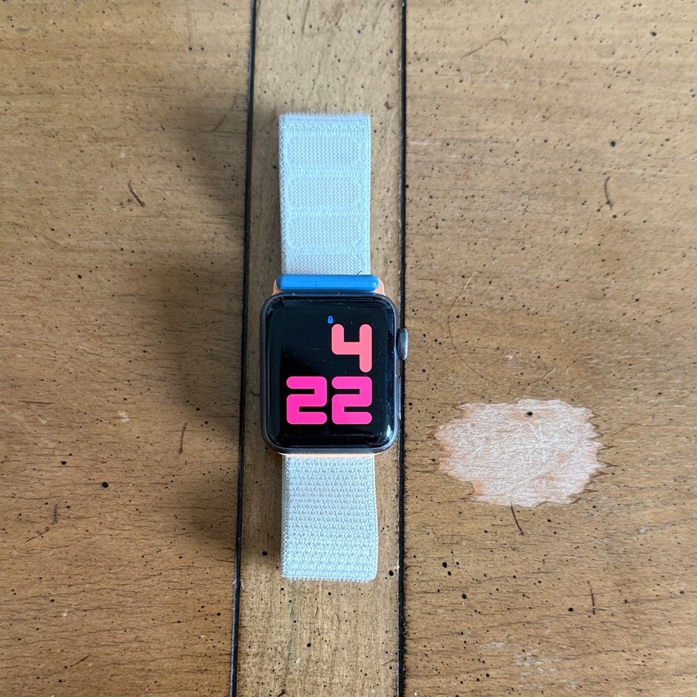 Apple Smartwatch with Silver Case and Light Gray Band
